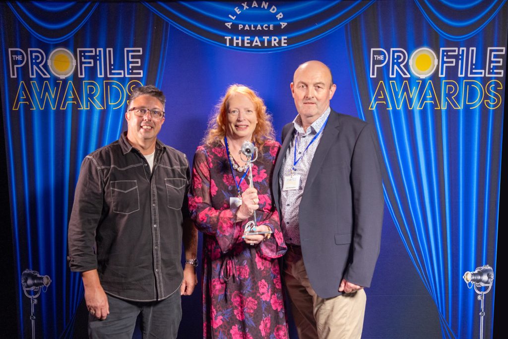 Andy Mahaffey of AC-ET with Rebecca Napton and John Bermingham